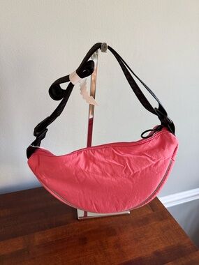 FREE PEOPLE MOVEMENT Bulls Eye Sling Bag-Coral